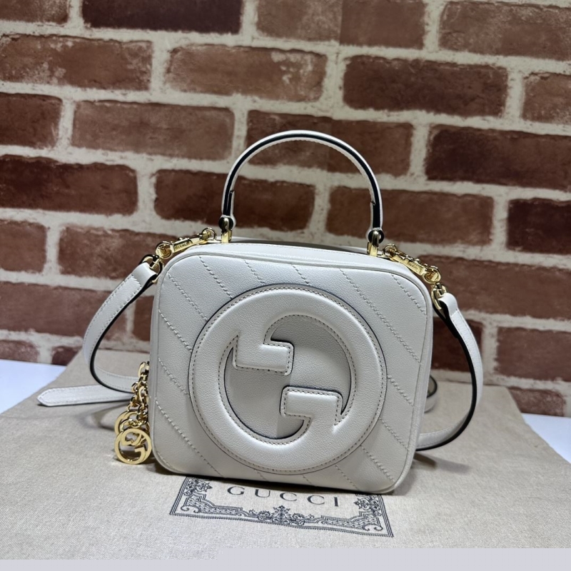G*u*i top handle bags